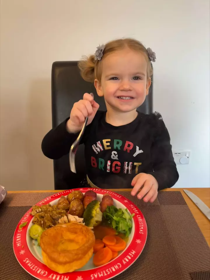 Imogen with her gluten free Christmas dinner and the best Yorkshire Pudding ever